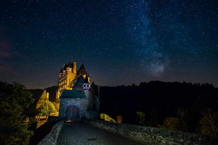 Eltz Castle at night under the Milky Way