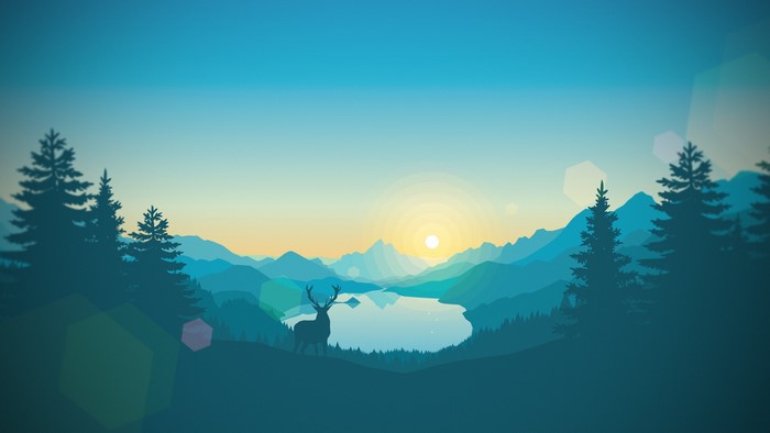 Deer in front of a lake and mountains at sunrise