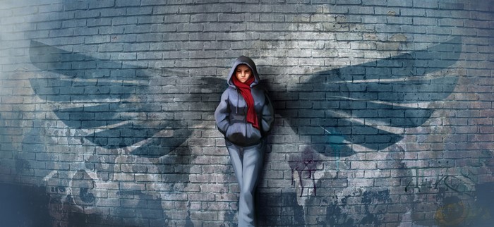 Person with Angel Wings Graffiti on Brick Wall
