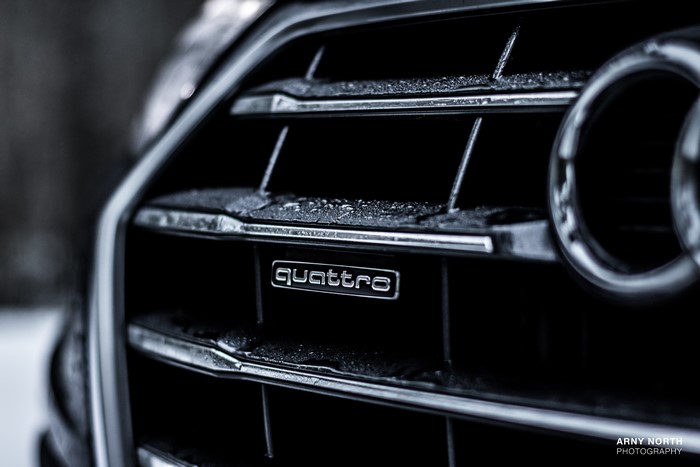 Audi Quattro emblem on car grille