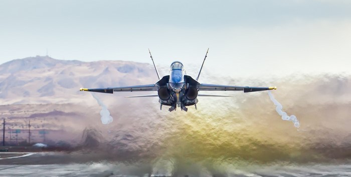 McDonnell Douglas F/A-18 Hornet jet fighter taking off