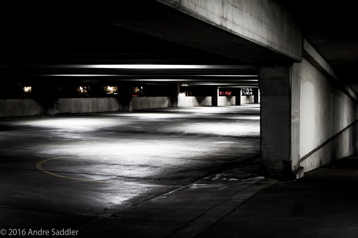 Empty parking garage at night
