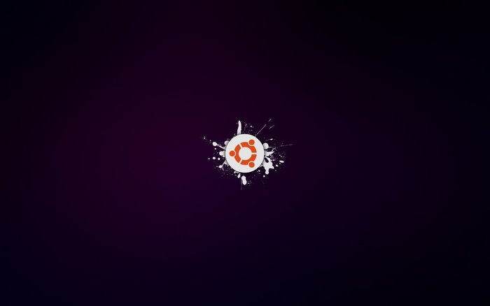 Ubuntu logo with white paint splatters on dark background