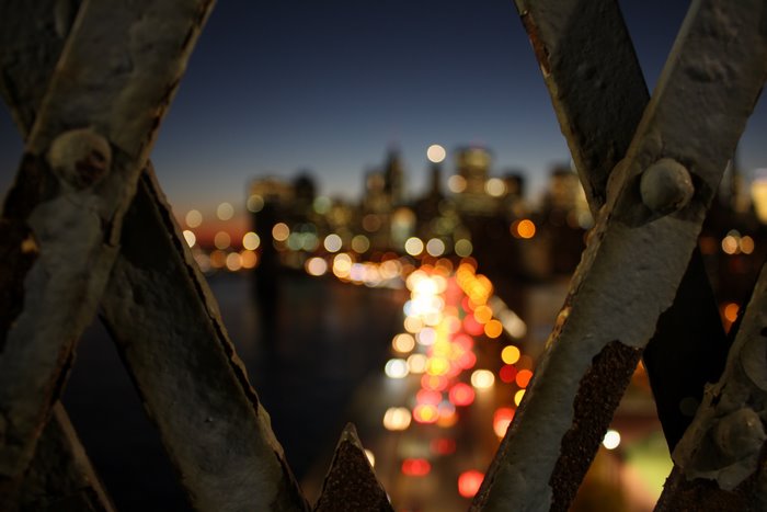 New York City bridge at night with blurred lights