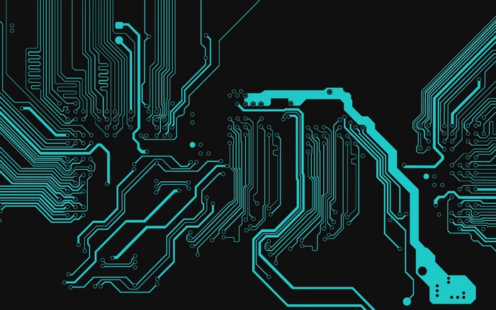 Abstract blue circuit board patterns on black background