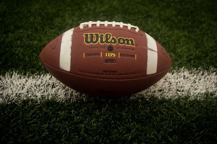 Wilson TDS Football on Grass Field 4K