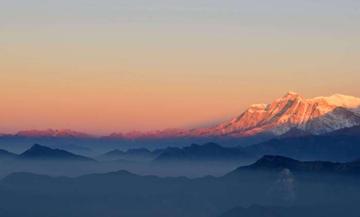 Himalayas mountains landscape at sunrise with fog 4K