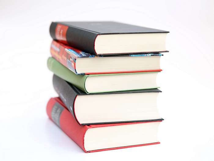 Stack of books on a white background