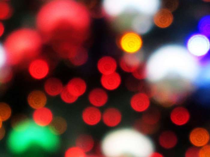Abstract bokeh lights in red, blue, green, and yellow 4K