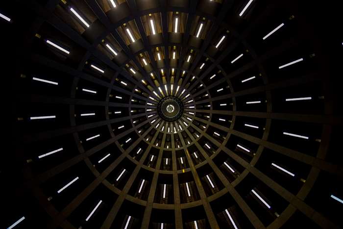 Abstract circular pattern of lights in a dark dome