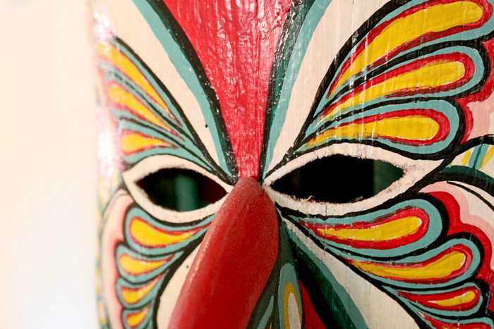 Close up of a colorful painted mask