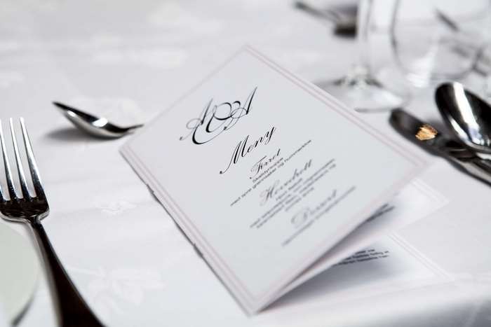 Elegant menu on a formal dining table setting