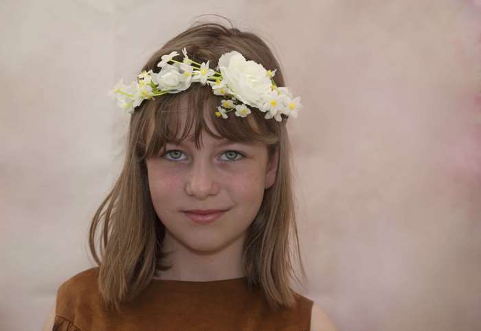 Happy Young Girl with White Flower Crown 4K