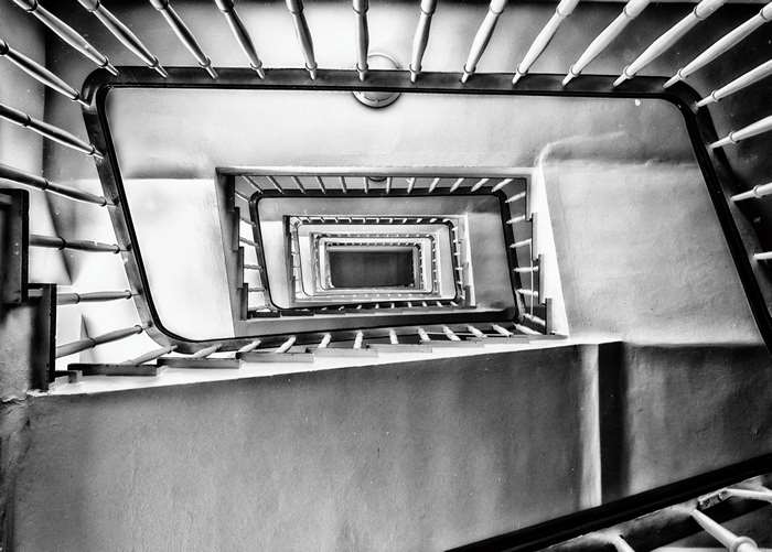 Spiral staircase viewed from above, black and white