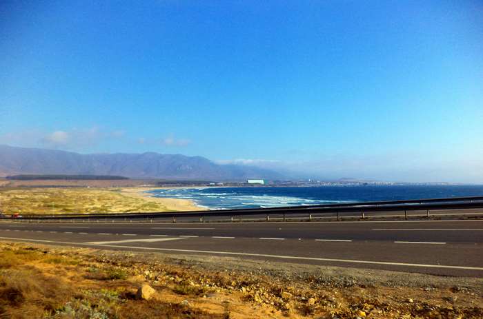 Coastal highway overlooking a beach and city in Coquimbo, Chile