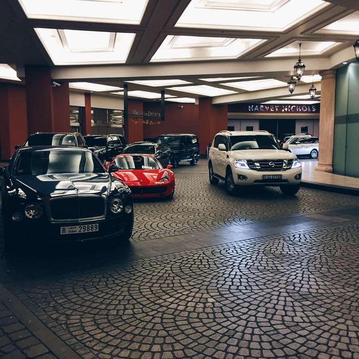 Luxury cars parked at Harvey Nichols, Dubai