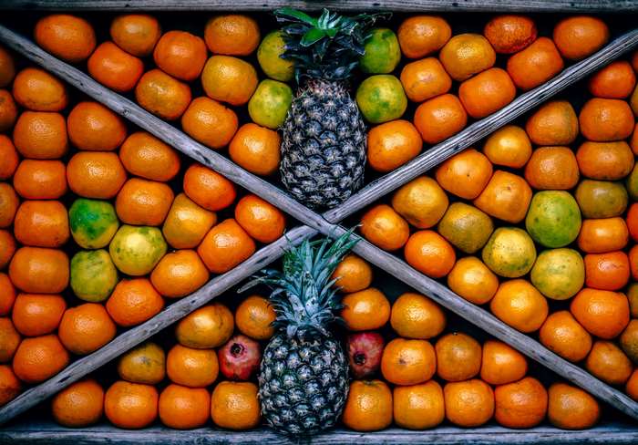 Oranges and Pineapples in a Display