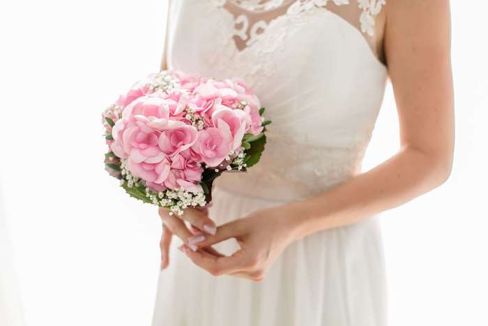 Bride Holding Pink Wedding Bouquet