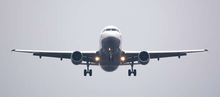 Airplane landing in the sky