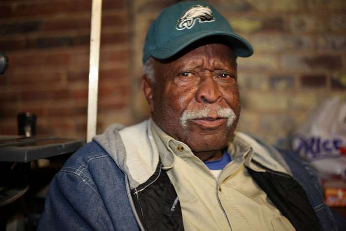 Elderly man wearing a Philadelphia Eagles cap