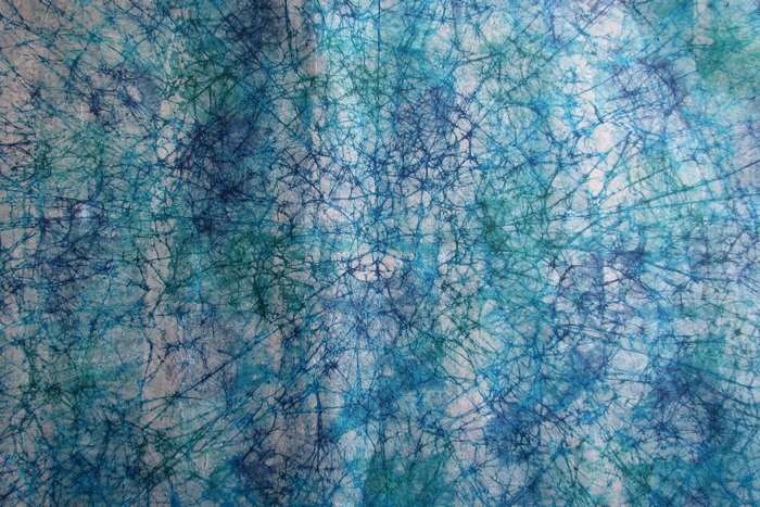 Abstract blue and turquoise tie-dye texture