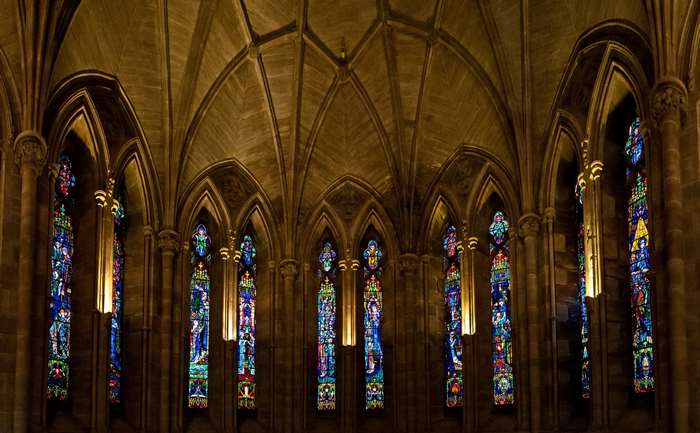 Interior of a Gothic cathedral with stained glass windows