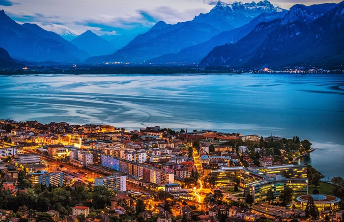 Evening View of Swiss Lakeside City with Mountains 4K