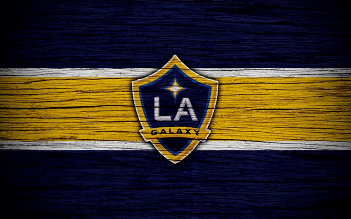 LA Galaxy logo on a wooden background