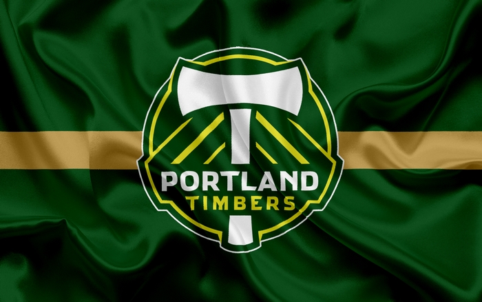Portland Timbers MLS logo on green and gold flag