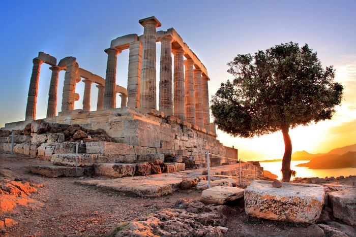 Temple of Poseidon ruins in Greece at sunset