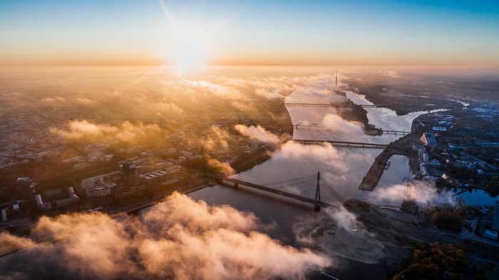 Aerial view of Riga, Latvia at sunrise with clouds