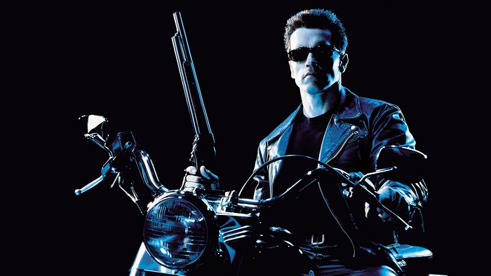 Arnold Schwarzenegger as the Terminator on a motorcycle