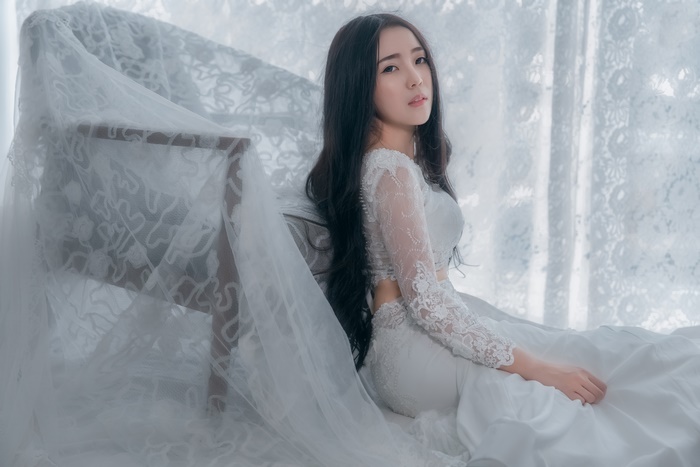 Elegant Asian Bride in White Wedding Dress