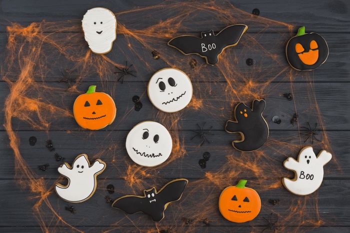 Halloween cookies with bats, ghosts, and pumpkins