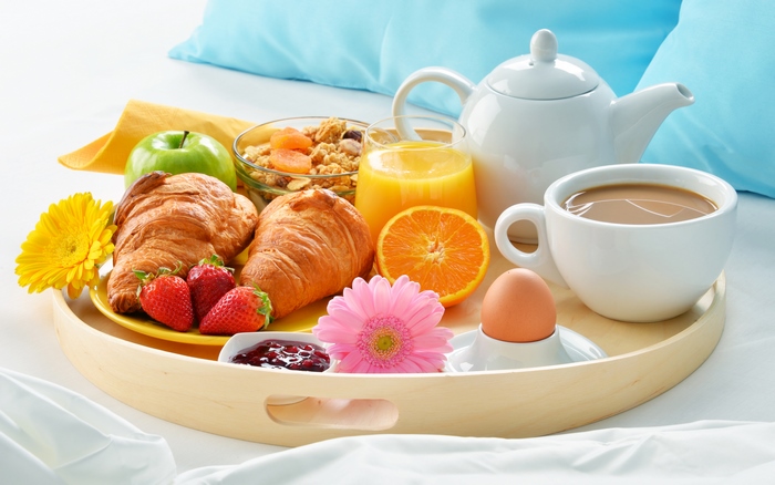Fresh Breakfast Tray with Croissants, Juice, and Coffee