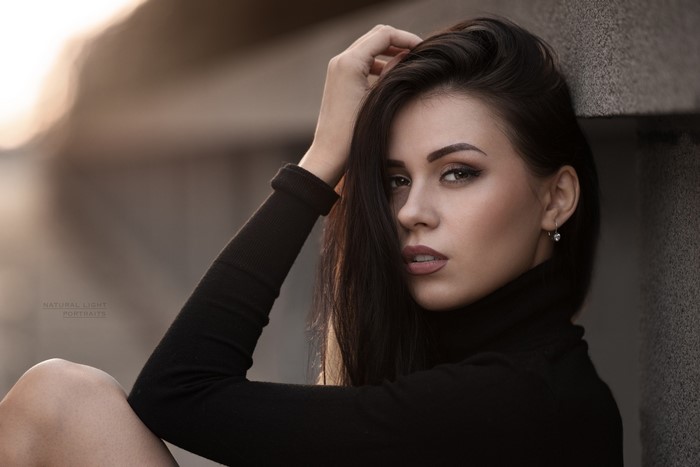 Woman with black hair and brown eyes