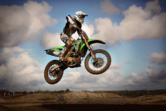 Dirt Bike Rider Mid-Air Motocross Action