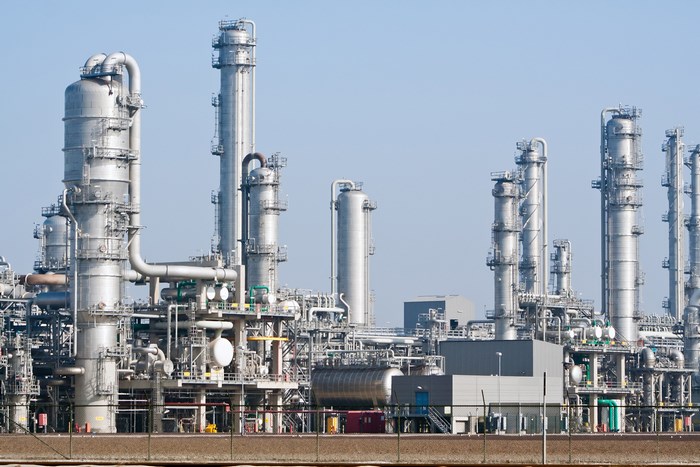 Industrial chemical plant with tall towers and pipelines