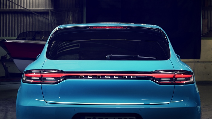 Rear view of a blue Porsche Macan