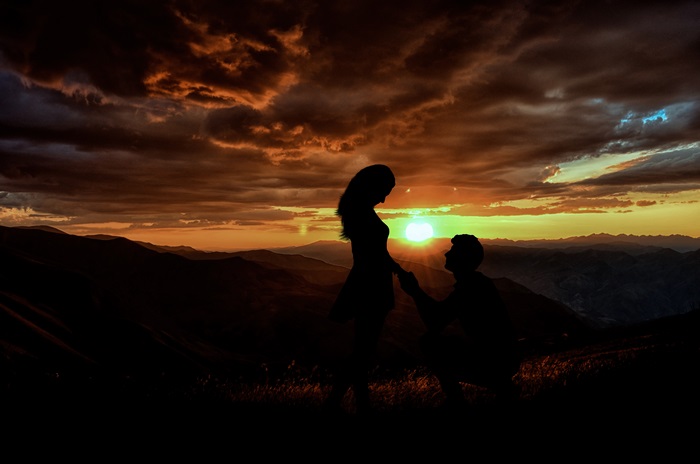 Couple Silhouette Proposal at Sunset