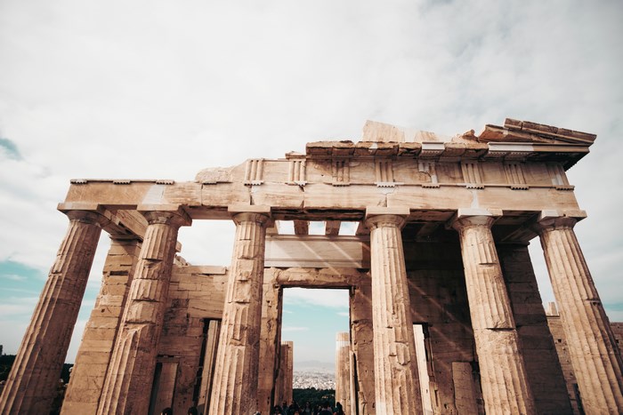 Ruins of ancient Greek temple with columns in Athens