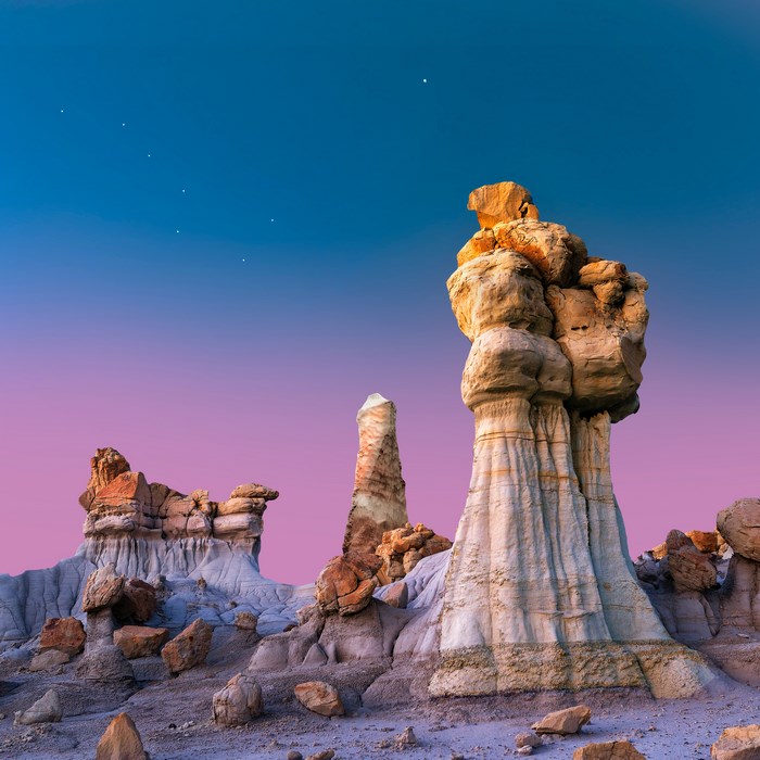 Rock formations in New Mexico desert at twilight