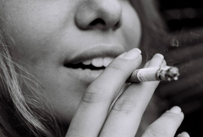 Close-up of a woman smoking a cigarette