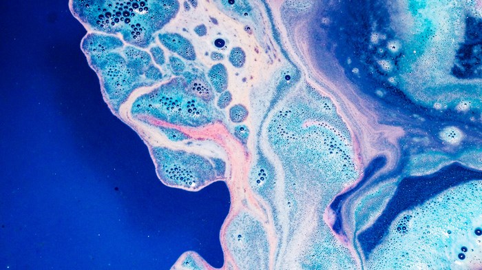 Abstract blue and pink foam pattern with bubbles