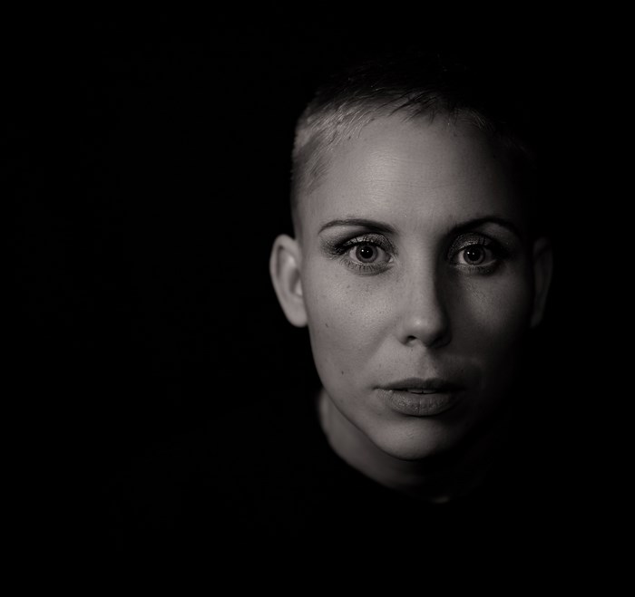 Black and white portrait of a woman with short hair