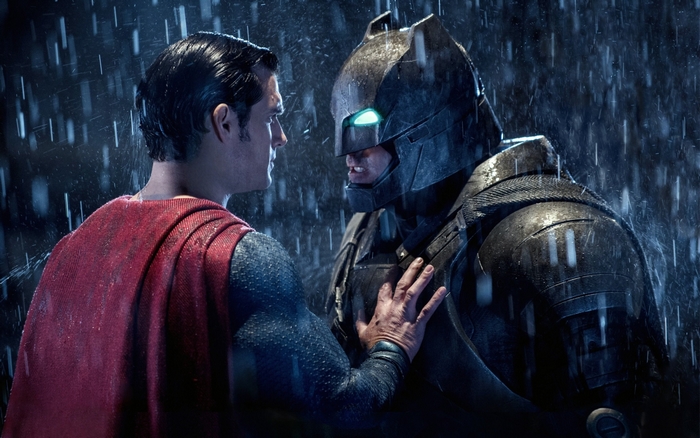 Superman and Batman in the rain
