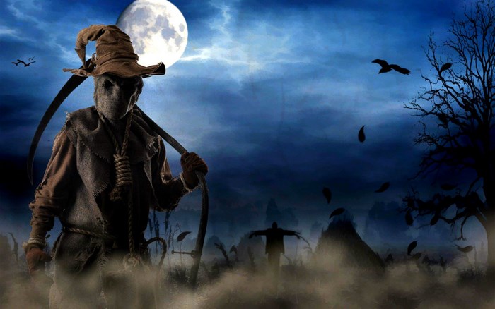 Scarecrow with Scythe on Halloween Night