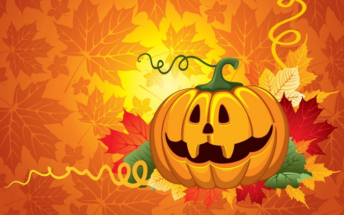 Halloween pumpkin with autumn leaves