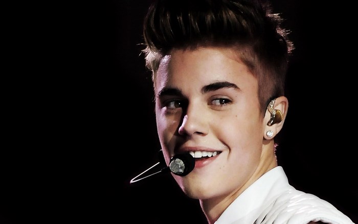 Justin Bieber Smiling with Microphone