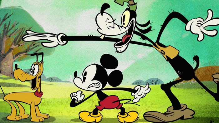 Mickey Mouse, Pluto, and Goofy in a park